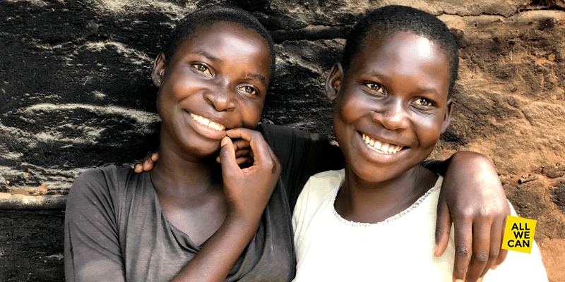 Twins Mwaiduma and Kiiza outside their home in Uganda